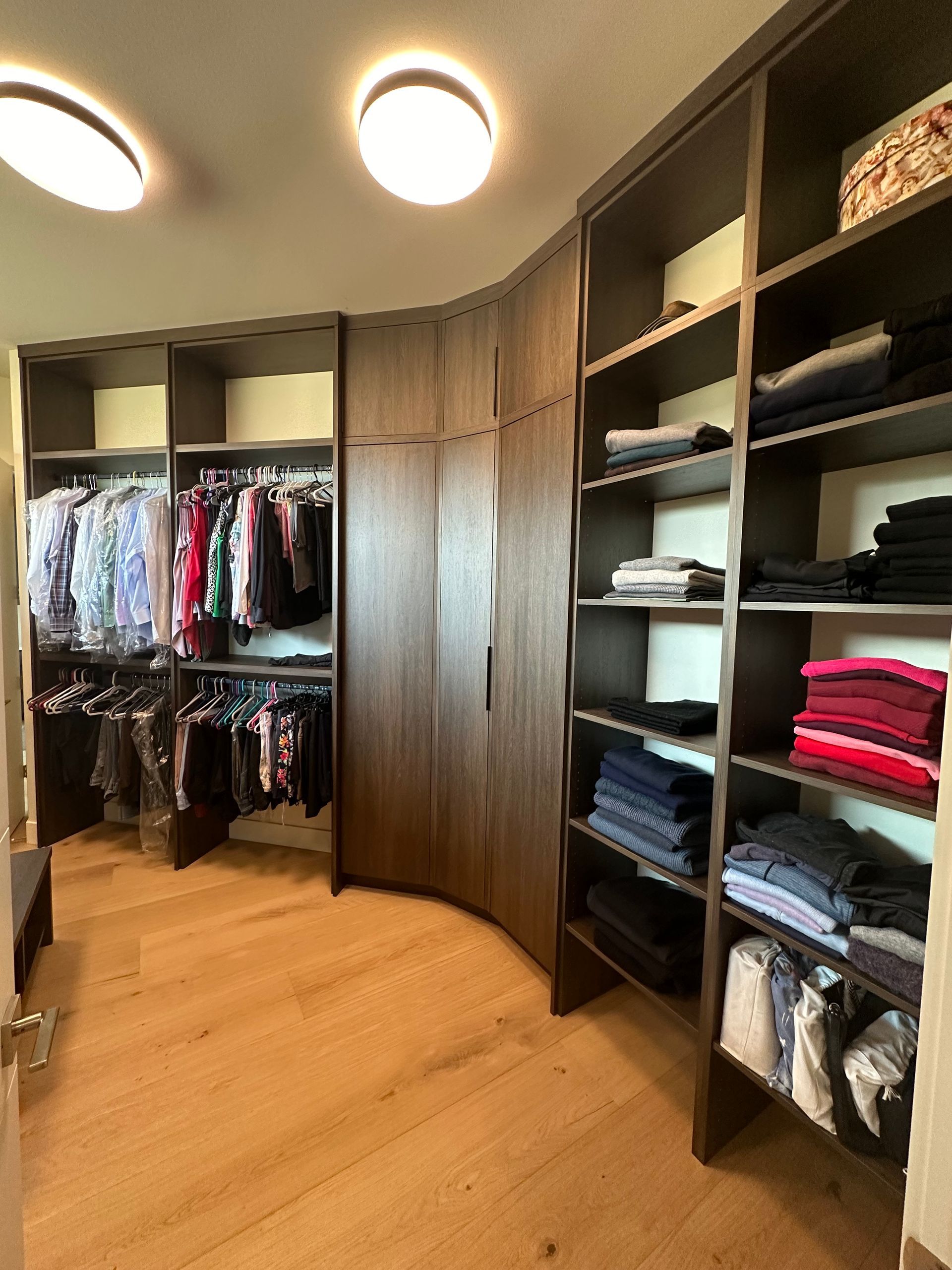 Custom walk-in closet with wood cabinetry — Portland-built by Pro-Tech Woodworking