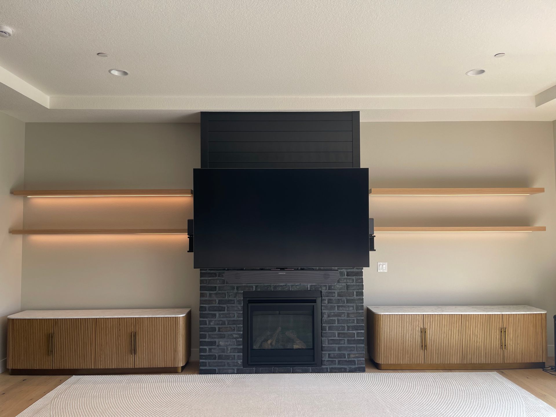  built-in shelves, and wood cabinets on either side in Portland, from Pro-techwoodworkig