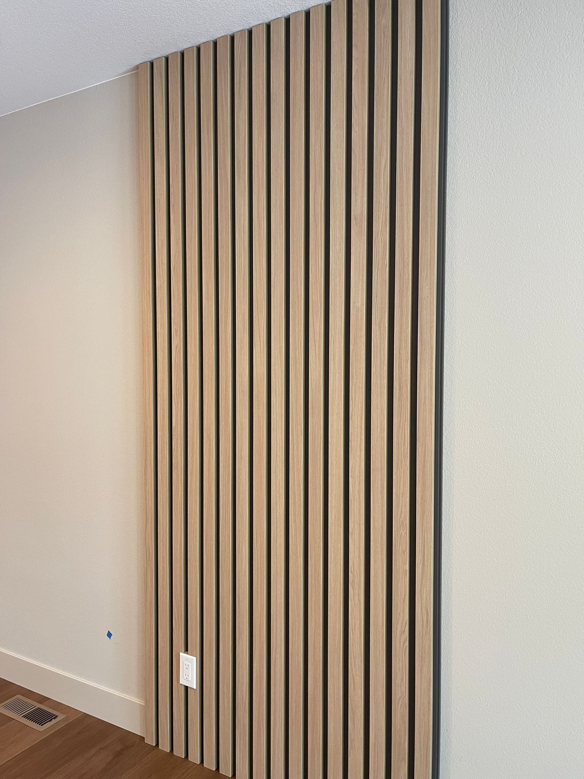 Pro-Tech Woodworking custom decorative panel made of vertical wooden slats, handcrafted to order in Portland
