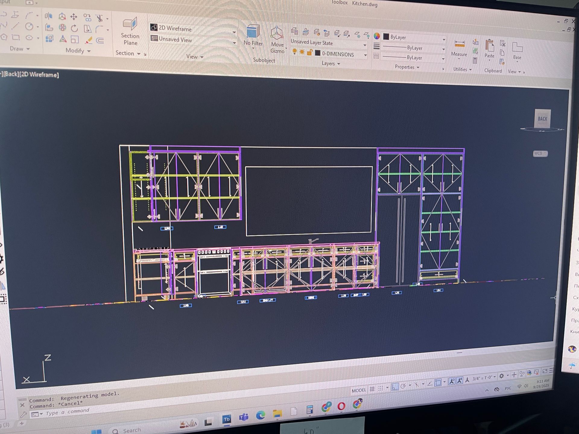 CAD drawing of a cabinet entertainment center, with purple and yellow wireframe detail, displayed on a computer screen.