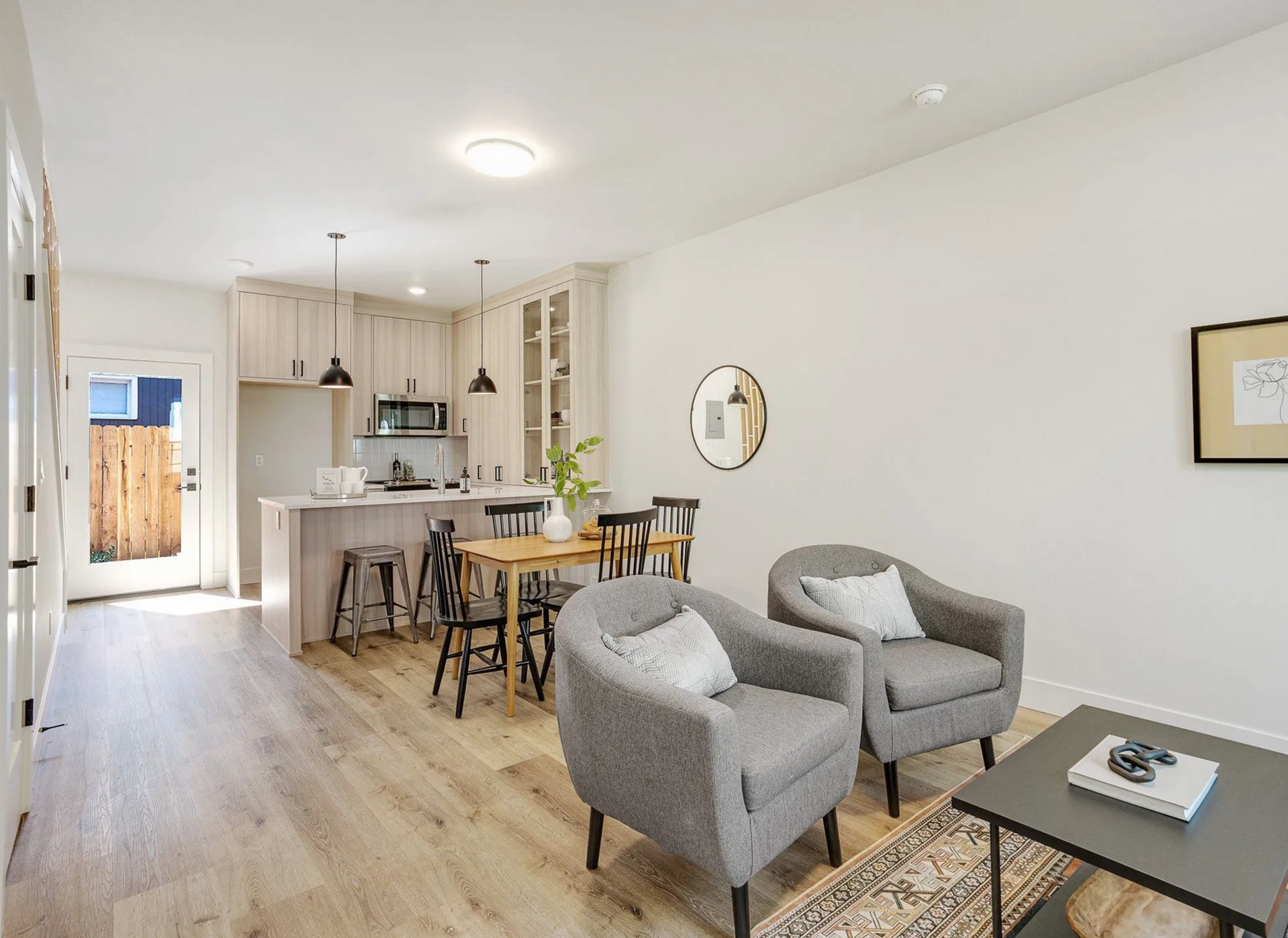Compact kitchen with upper cabinets, open shelves, and shaker fronts in Portland