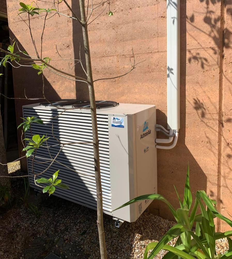 Actron Air Conditioner On A Wall — Air Conditioner in Macksville, NSW
