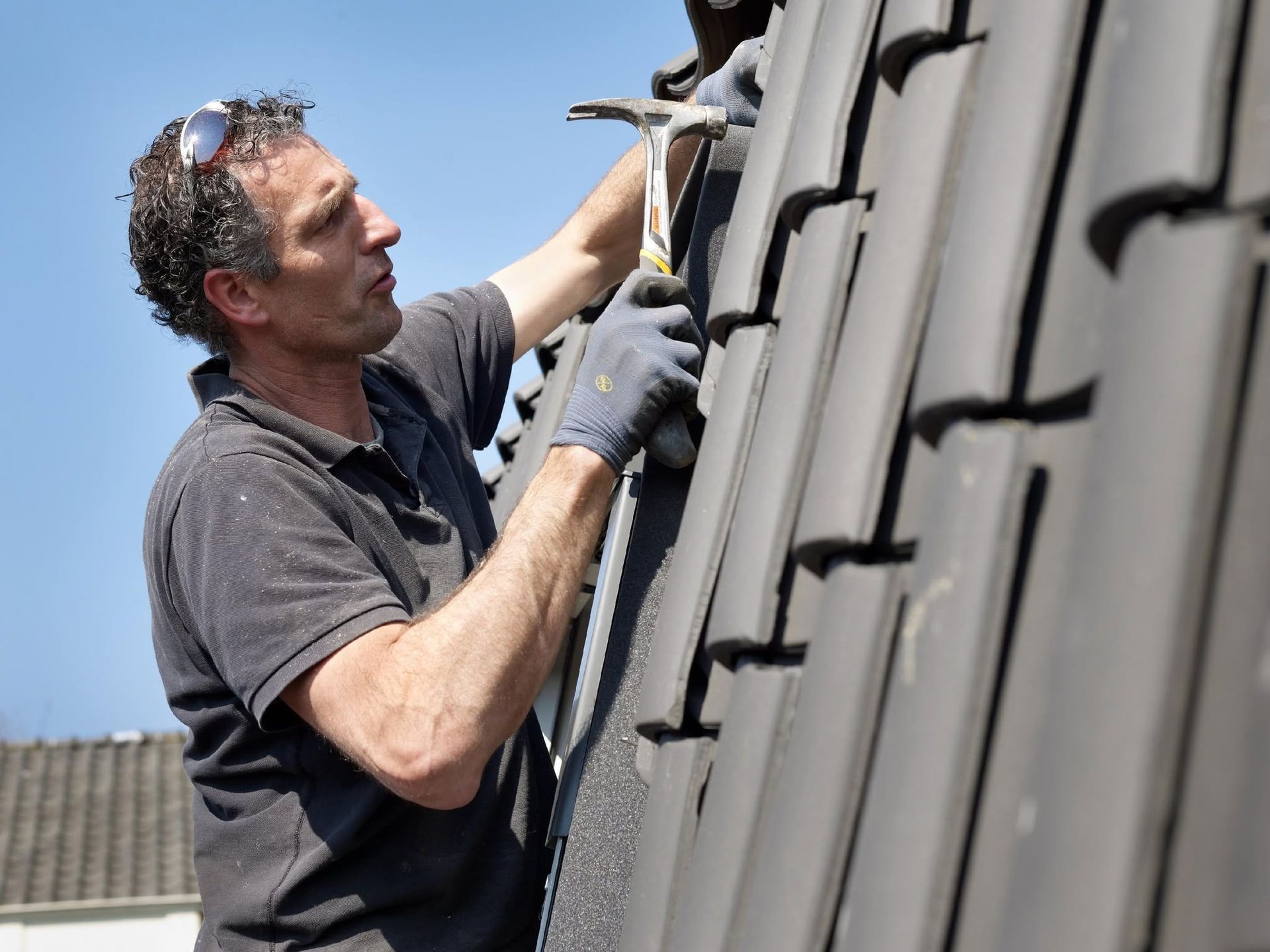 Roofer Fixing Roof in Gosford