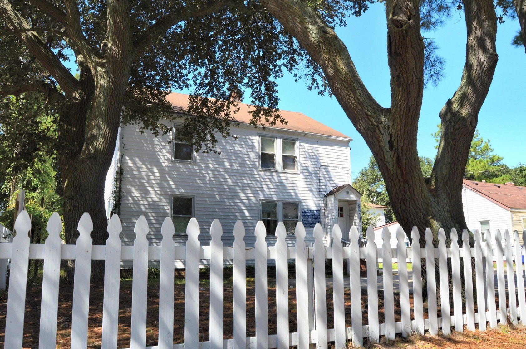 11th Bay St Building with fence