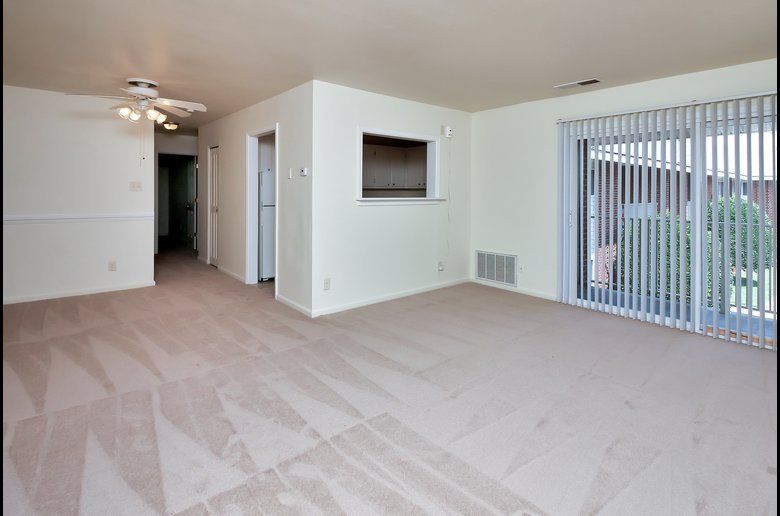 East Bay unfurnished living room and dining area