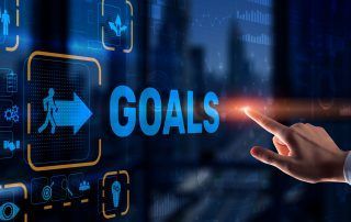 Hand touching a digital screen displaying the word 