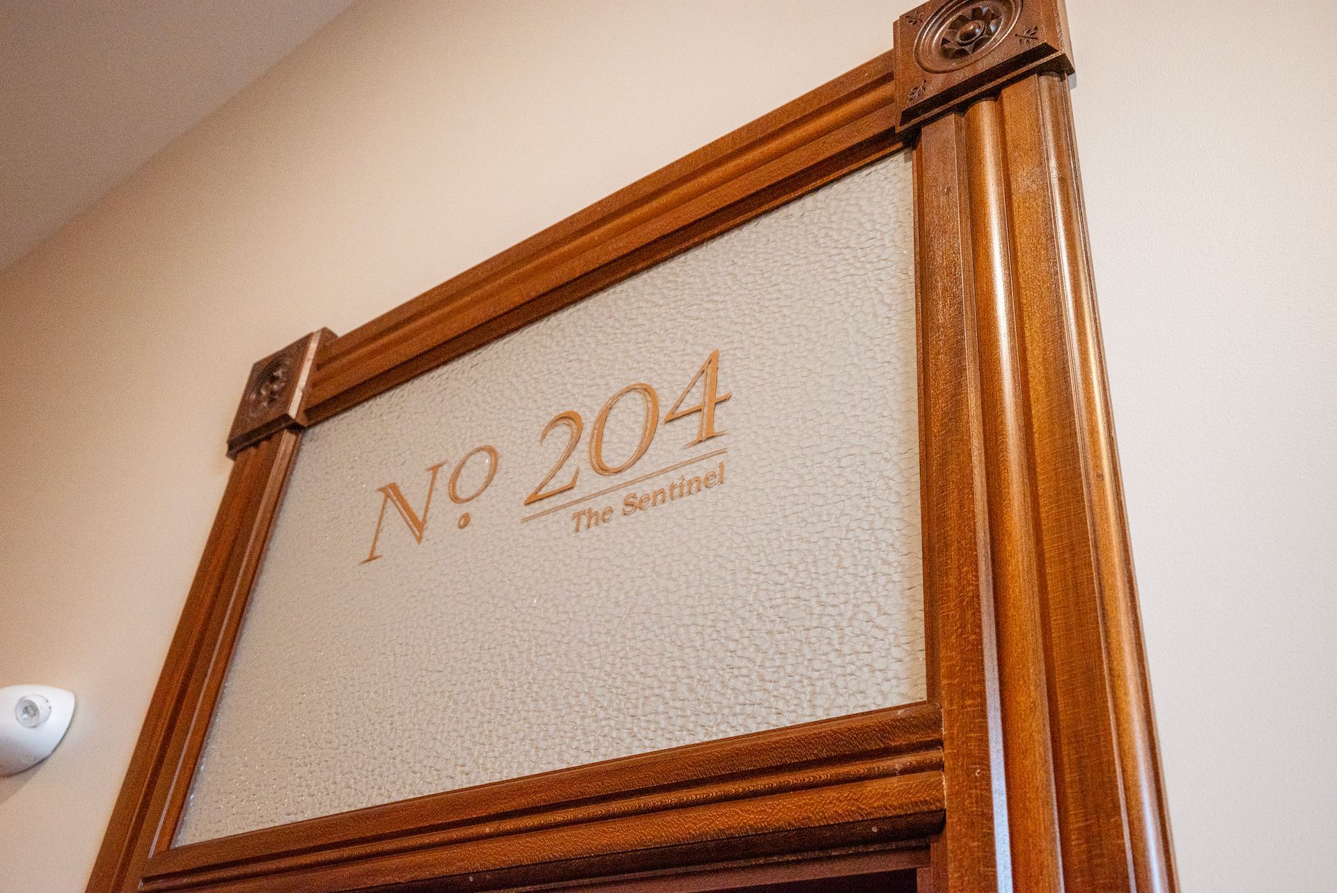 Door frame with frosted glass panel. 