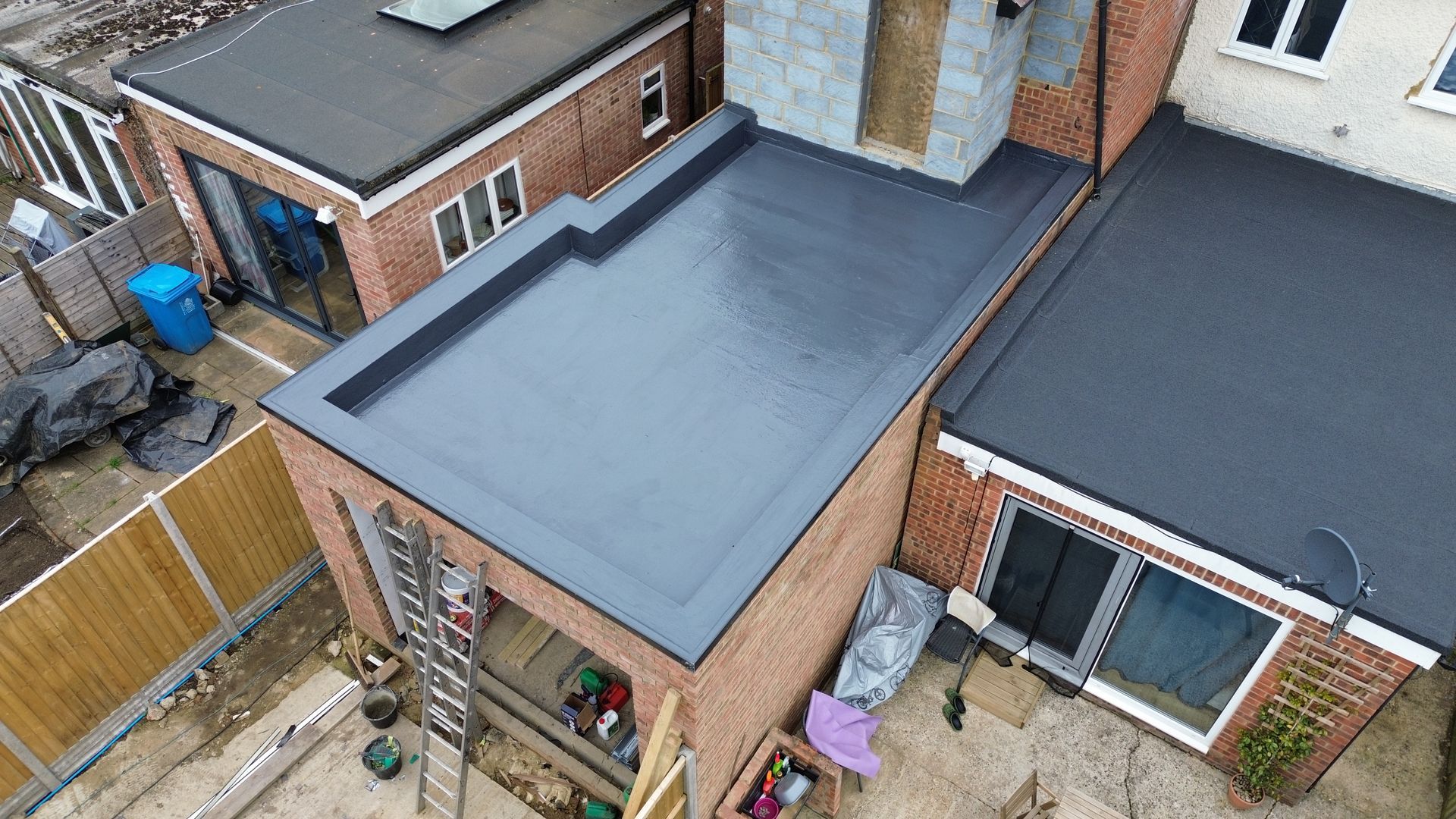 an aerial view of a house with a flat roof .