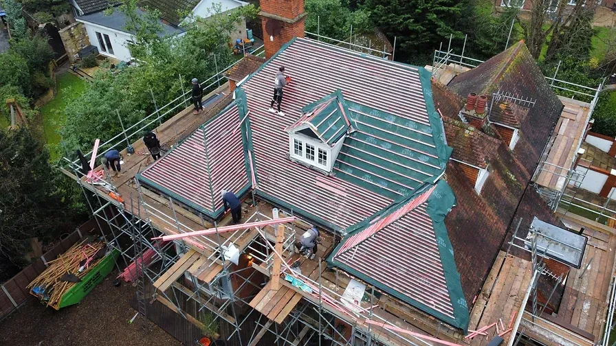 large country house with tiling being replaced