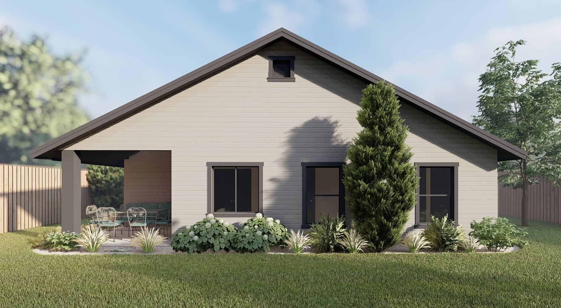 A small house with a porch and a fence in the backyard.