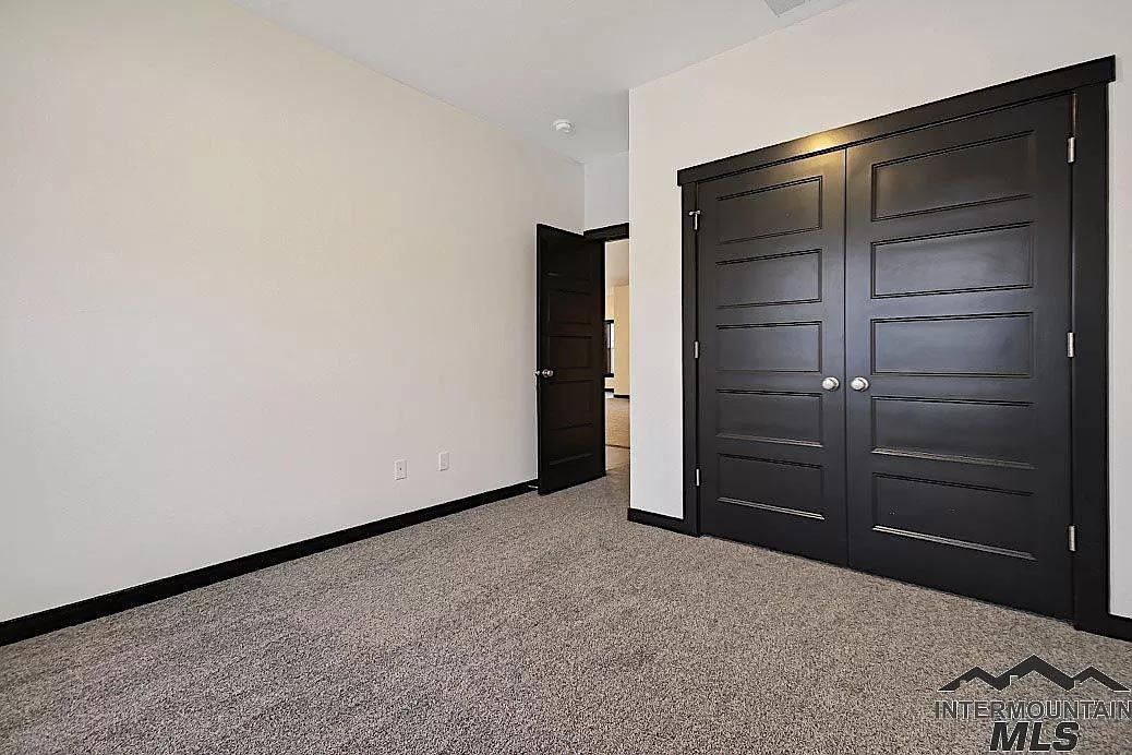 There is a large closet in the middle of the room.