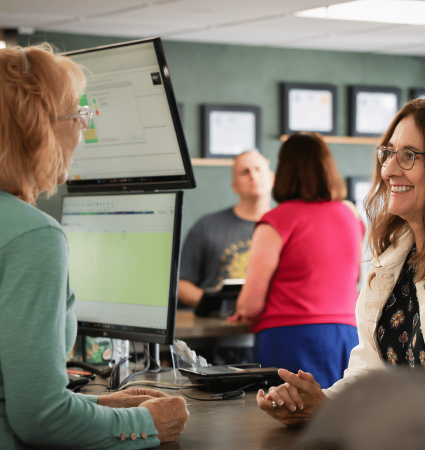 Valary talking with a customer