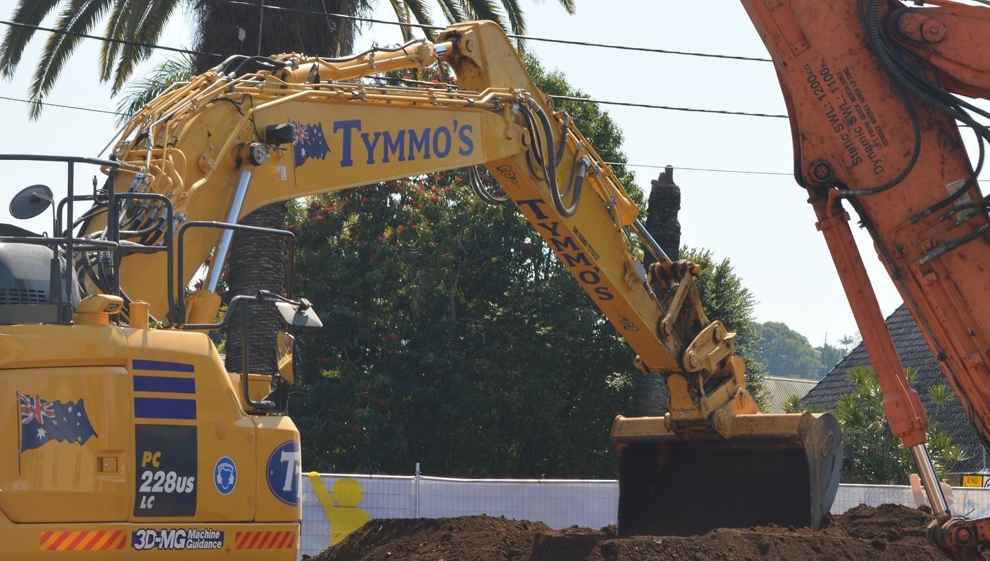 Yellow Excavator on Construction Site