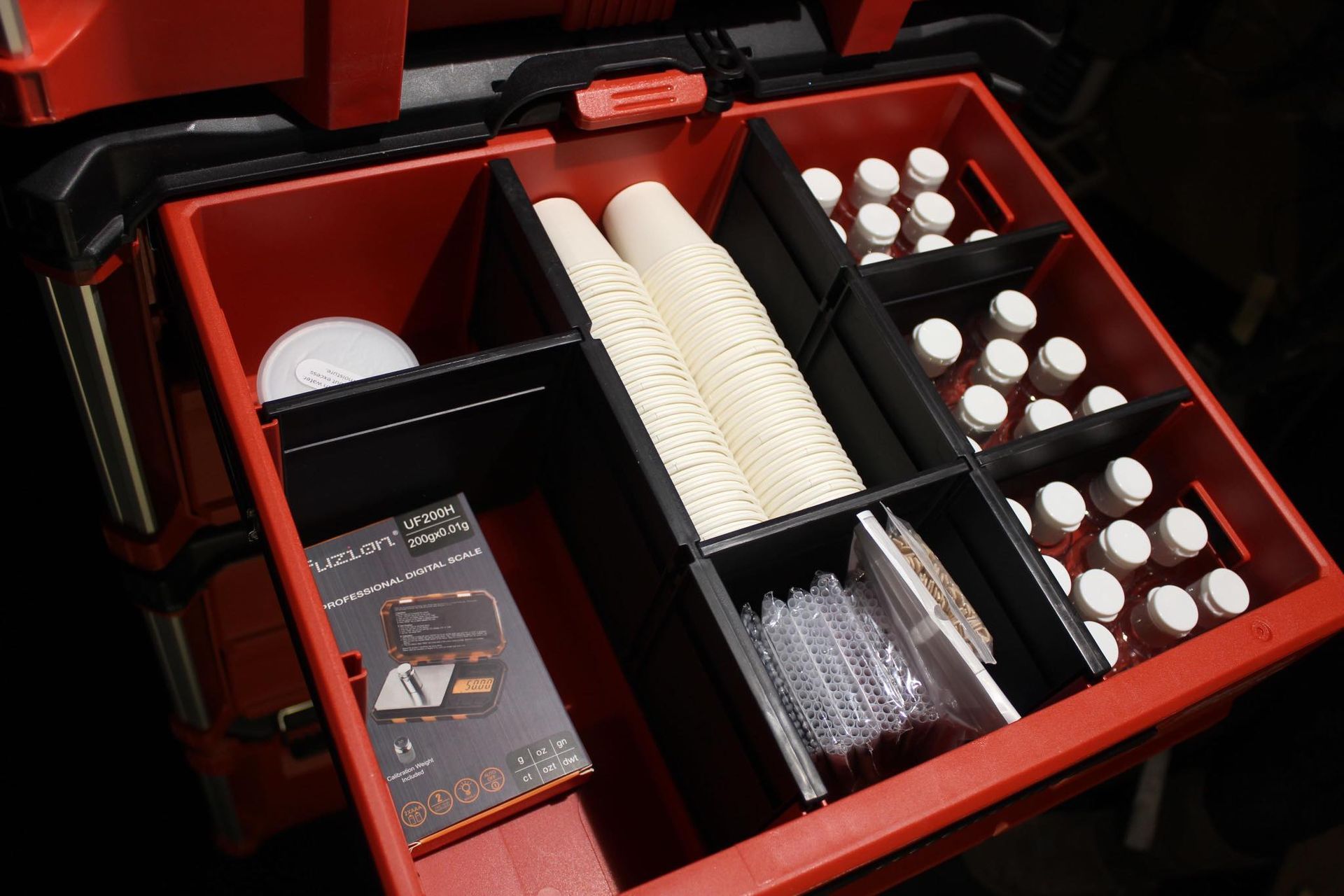 a drawer of touch up paint correction kit .