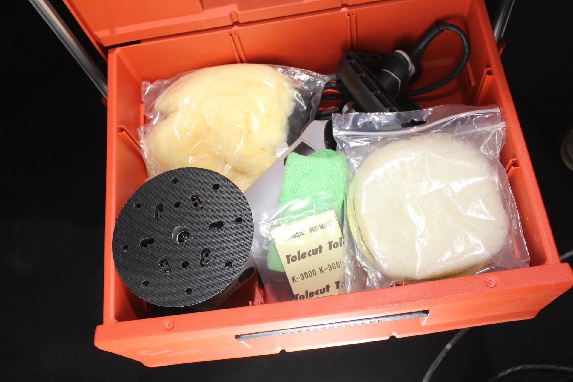 a drawer with all buffing supplies included with the s.m.a.r.t repair kit .