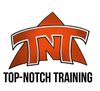 An orange and white logo for top-notch training