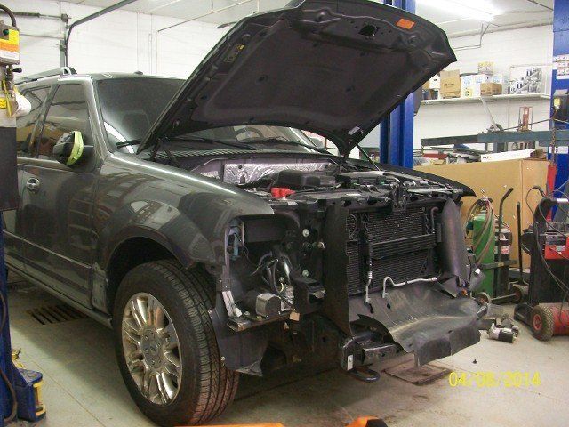 Car with Removed Bumper and Headlights — Villas, NJ — John's Auto Body