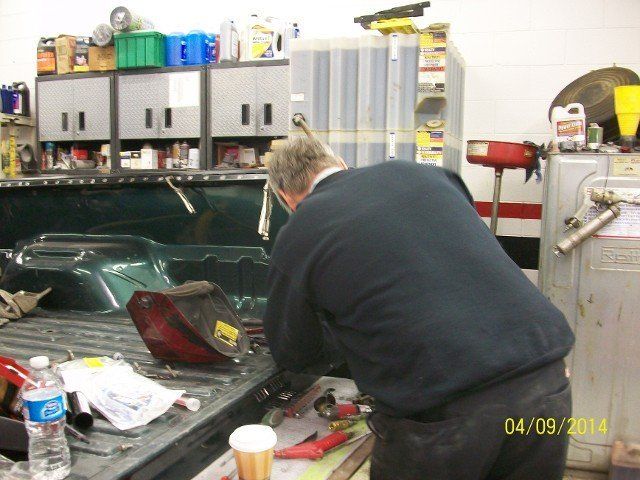 Mechanic Working on Truck — Villas, NJ — John's Auto Body