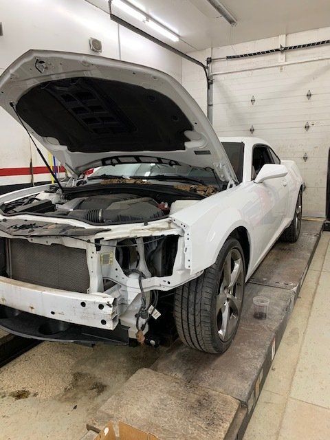 Side View Of An Open Hood Vehicle — Villas, NJ — John's Auto Body