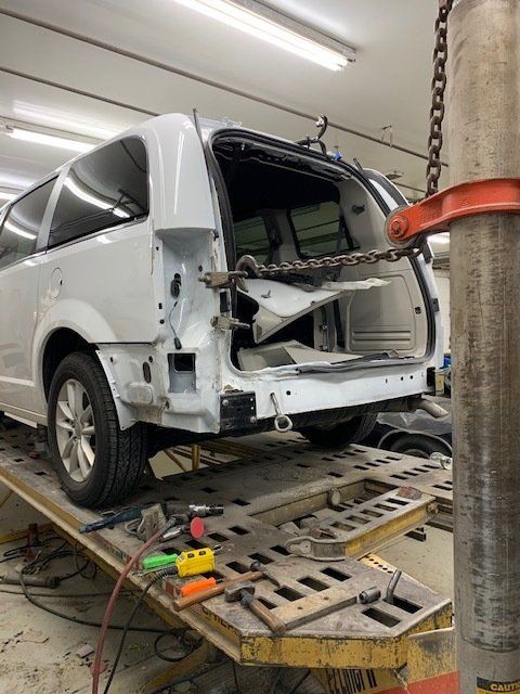 Repairing The Back Of The Vehicle — Villas, NJ — John's Auto Body