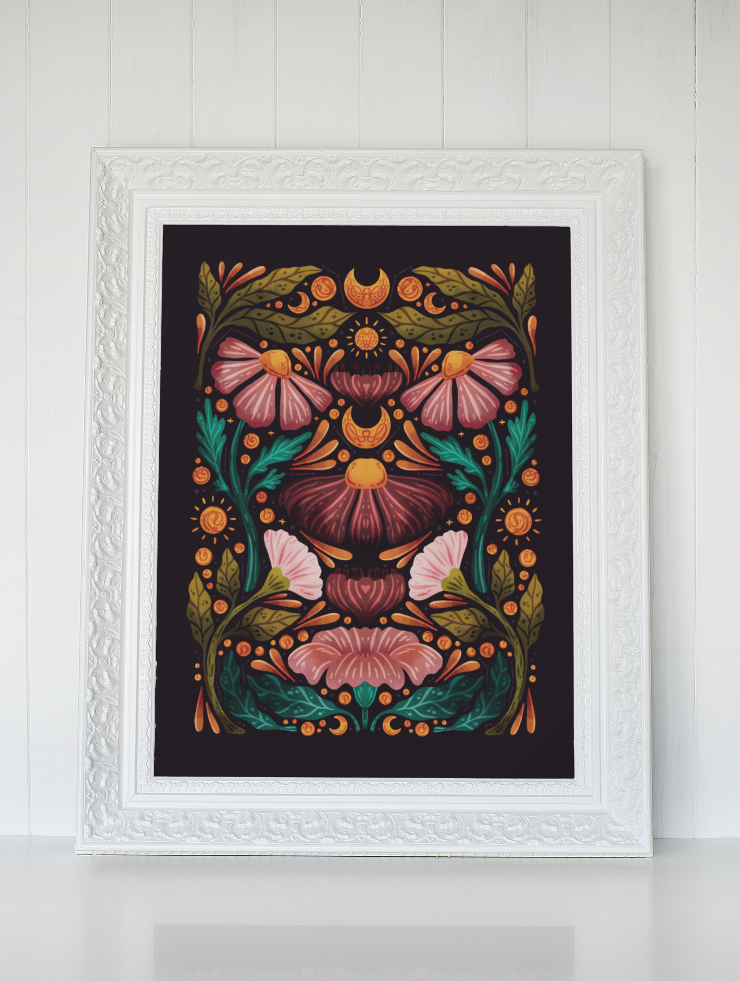 A painting in a white frame is hanging on a wall.