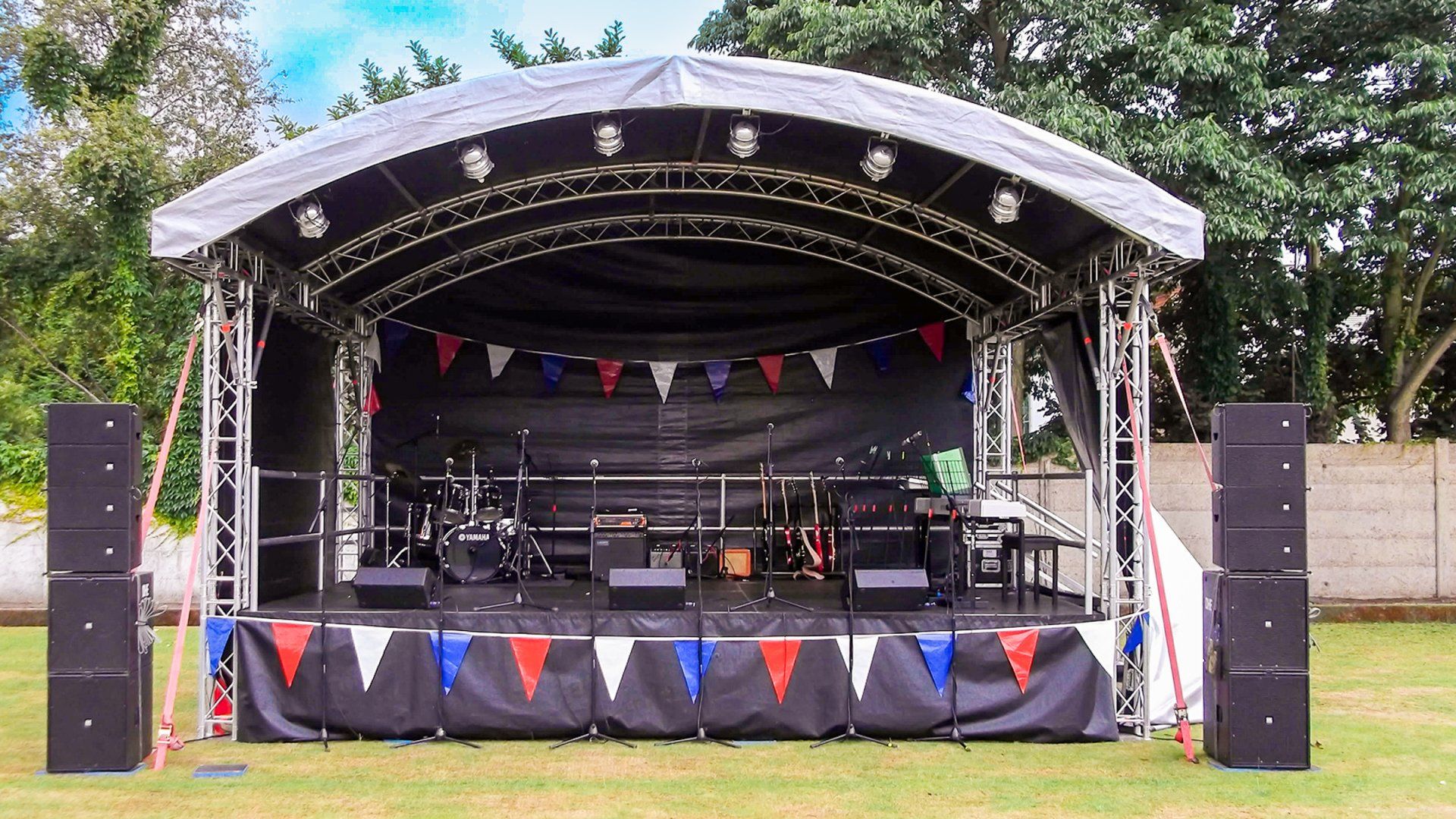 Arc stage set up with bunting