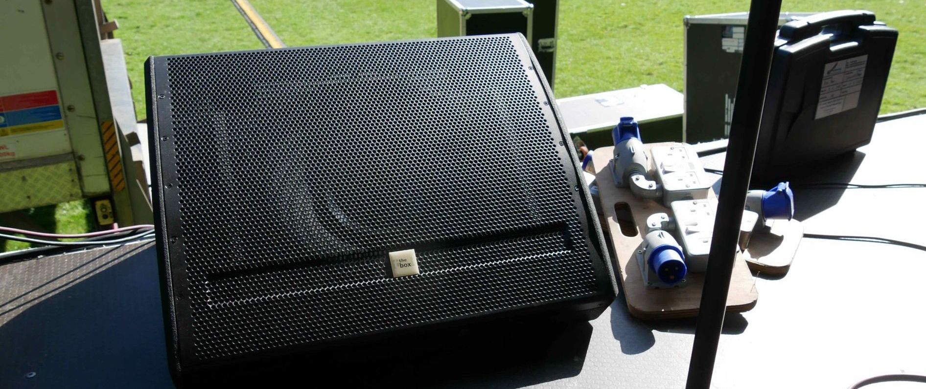 A close up of a stage speaker