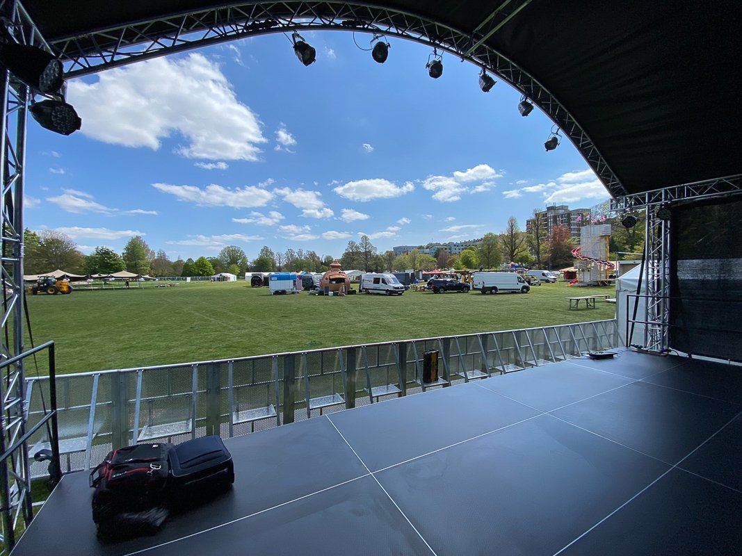 Interior view of Arc roof stage set up for an outdoor event