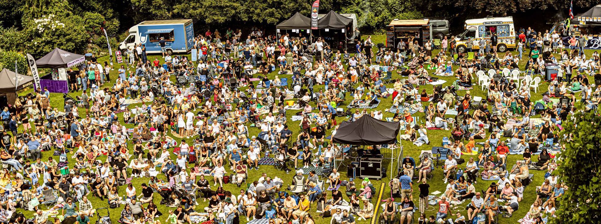 an ariel shot of a crowd at a festival