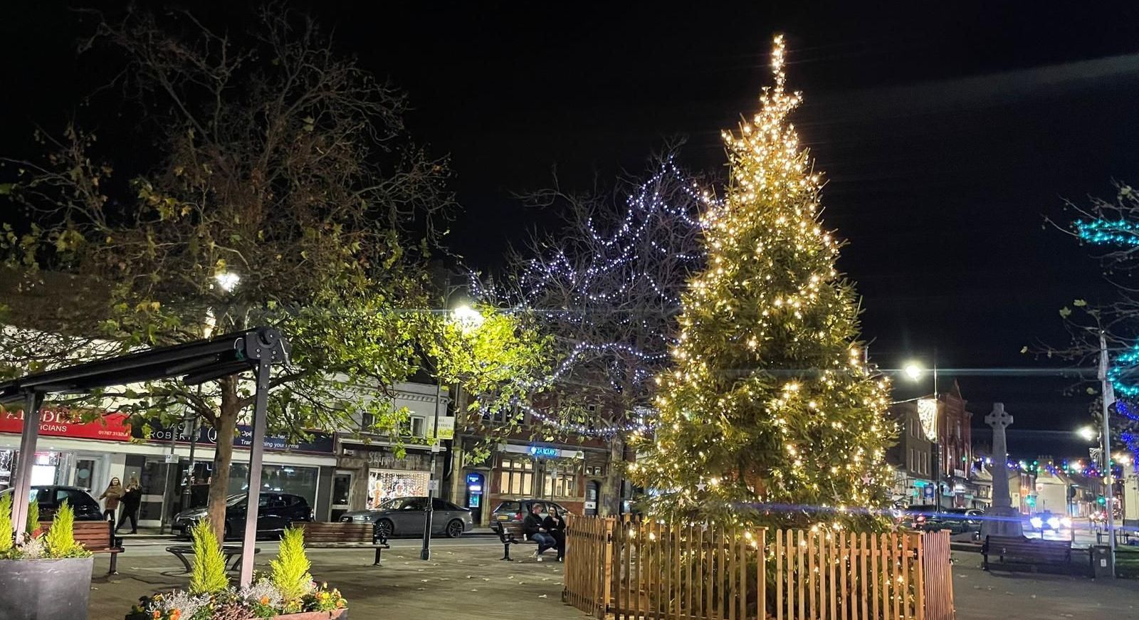 A beautiful lit up christmas tree in the middle of biggleswade town square