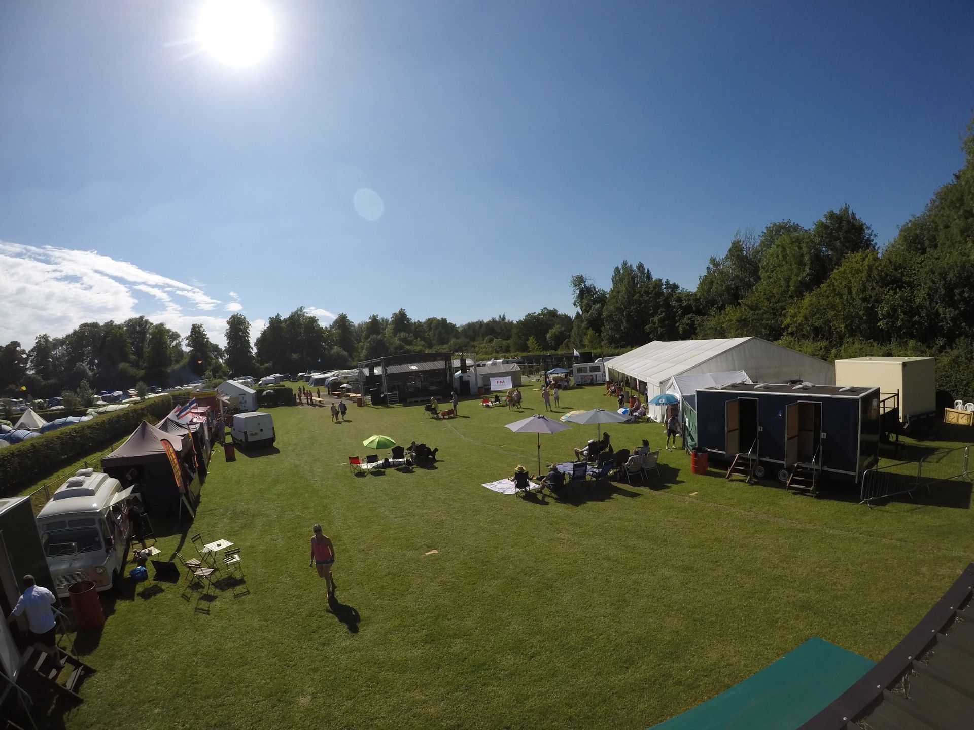 A wide angle fish eye view of an event site being set up.