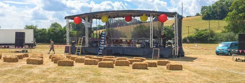 extra large trailer stage in a field