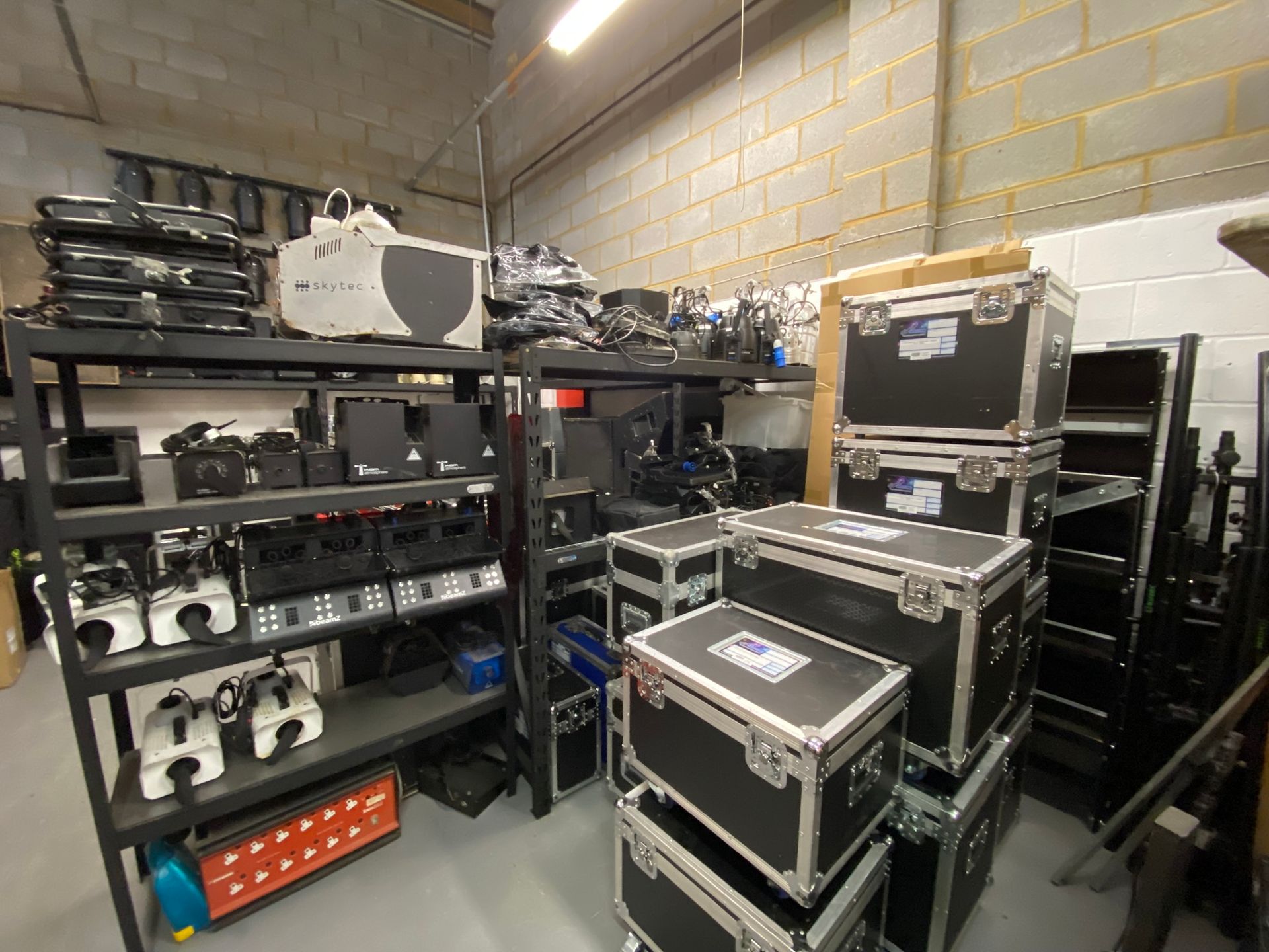 A shot of the inside of a warehouse with kit.