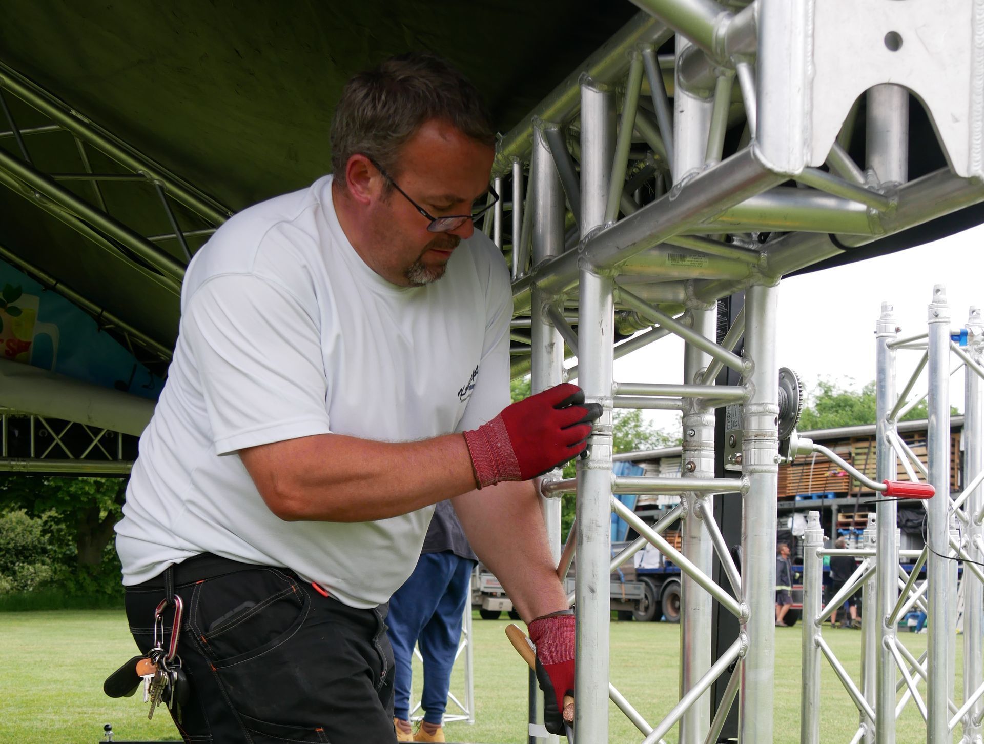 Martin at work setting up the arc truss stage at the Foodies event in St Albans