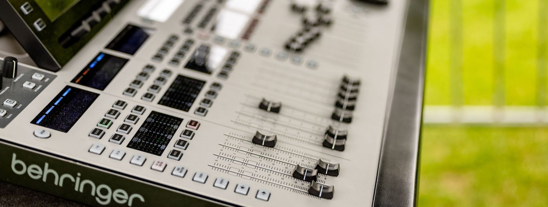 A close up of a mixing desk