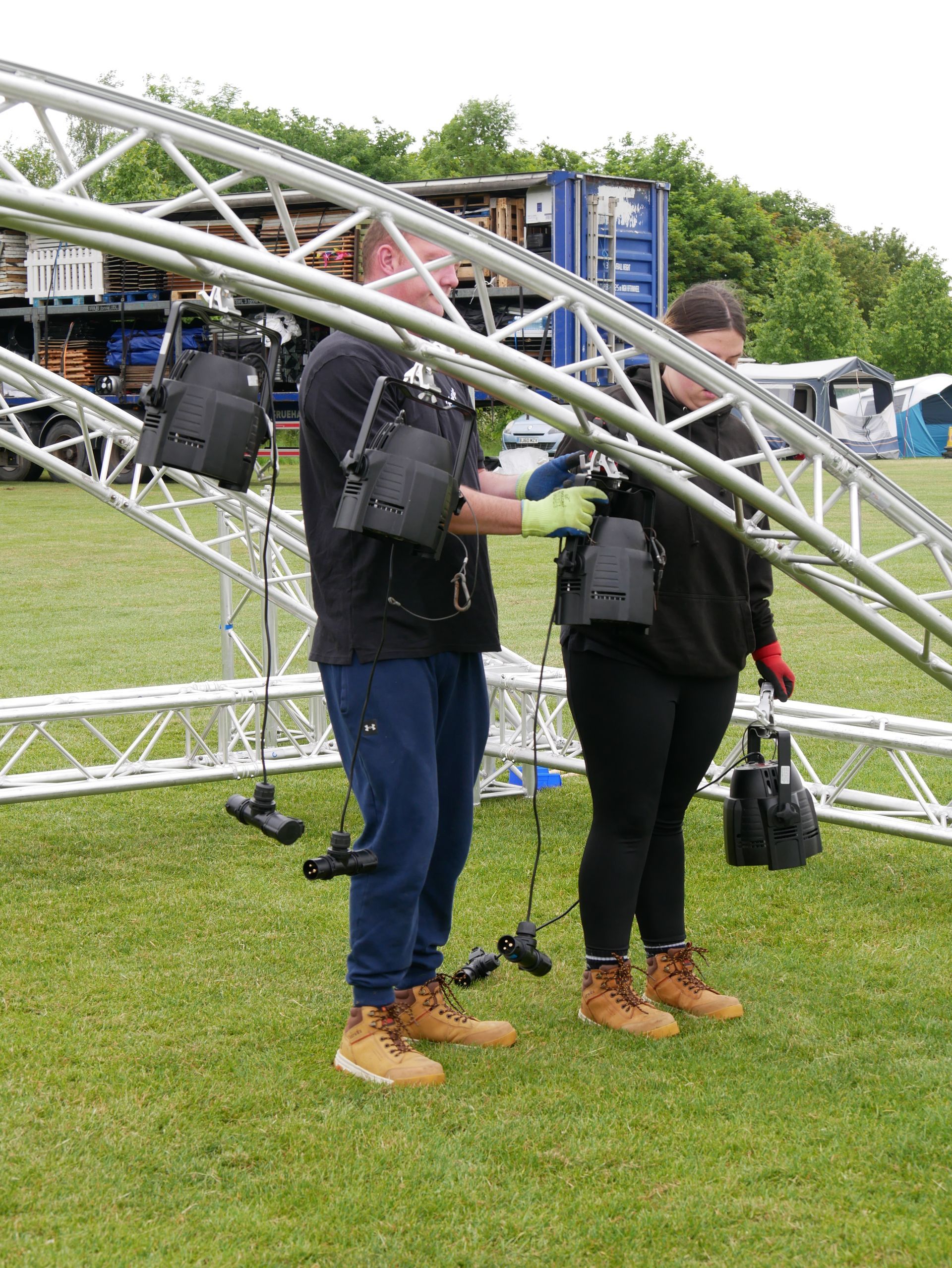 Crew members installing lights