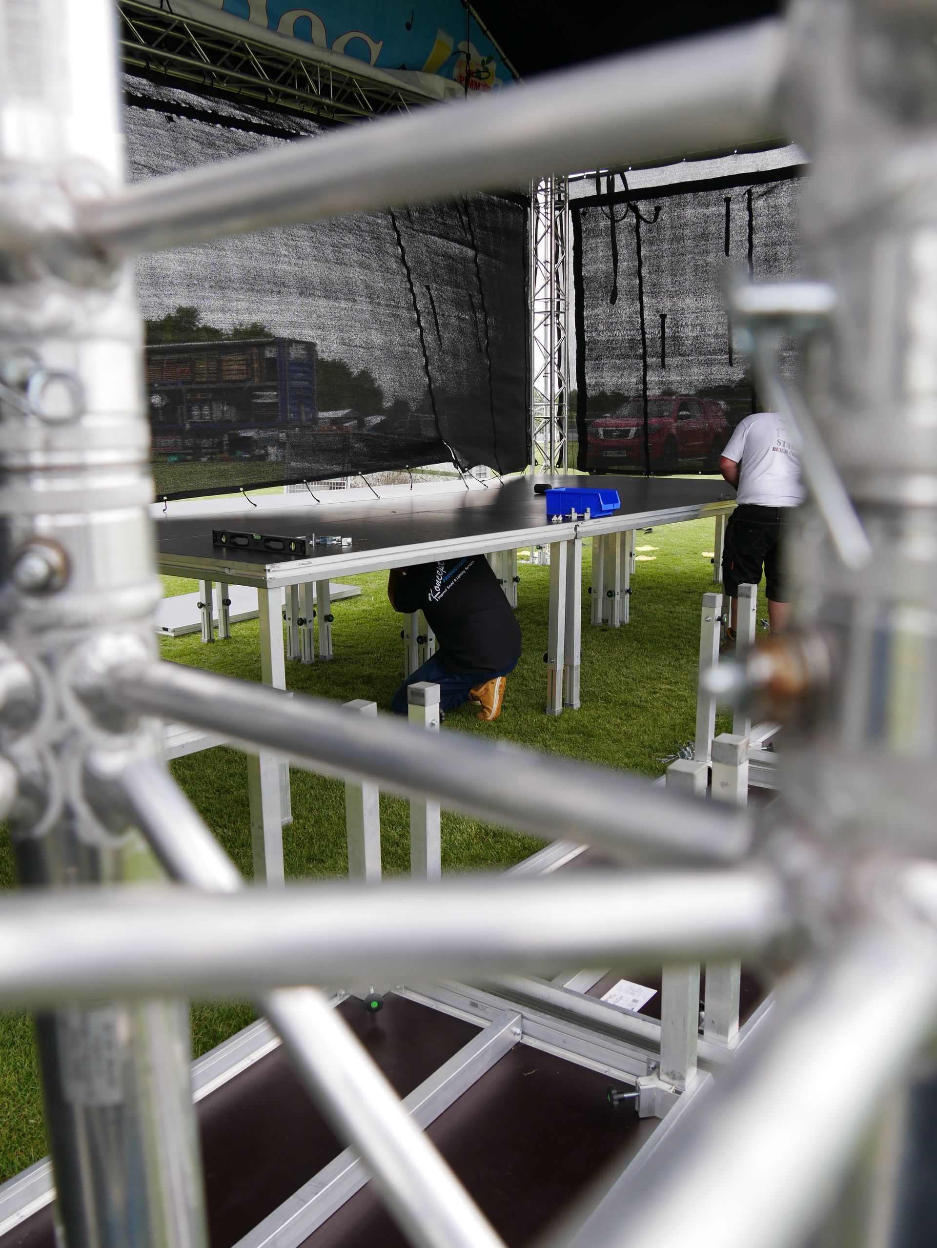 close up of the crew setting up the decking