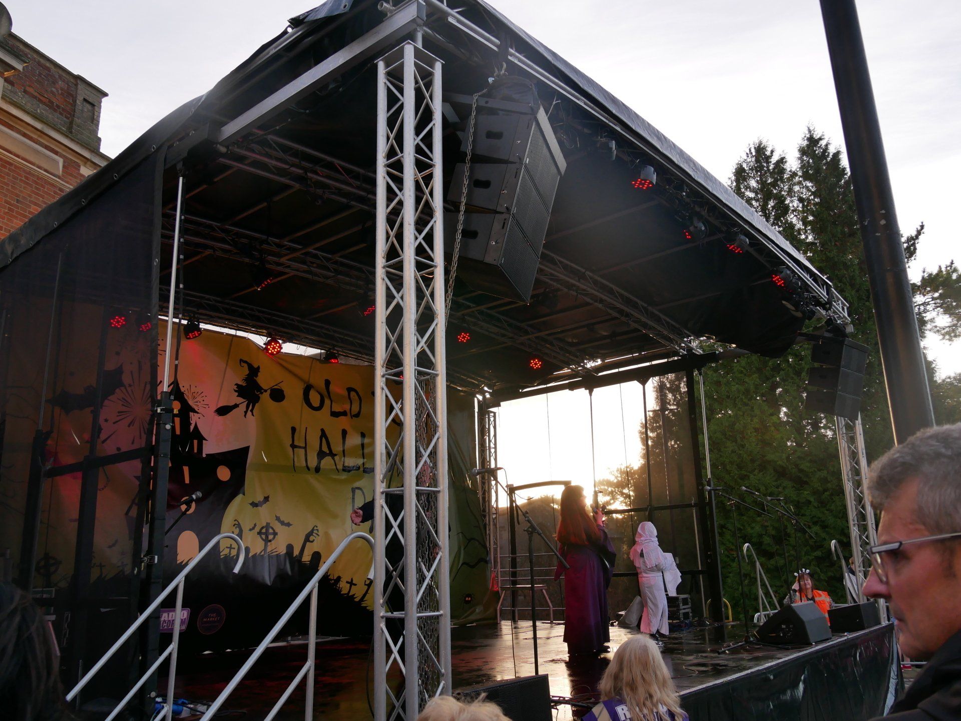 Trailer stage set up for the Halloween party Hemel Hempstead Old Town, with lighting and branded banners