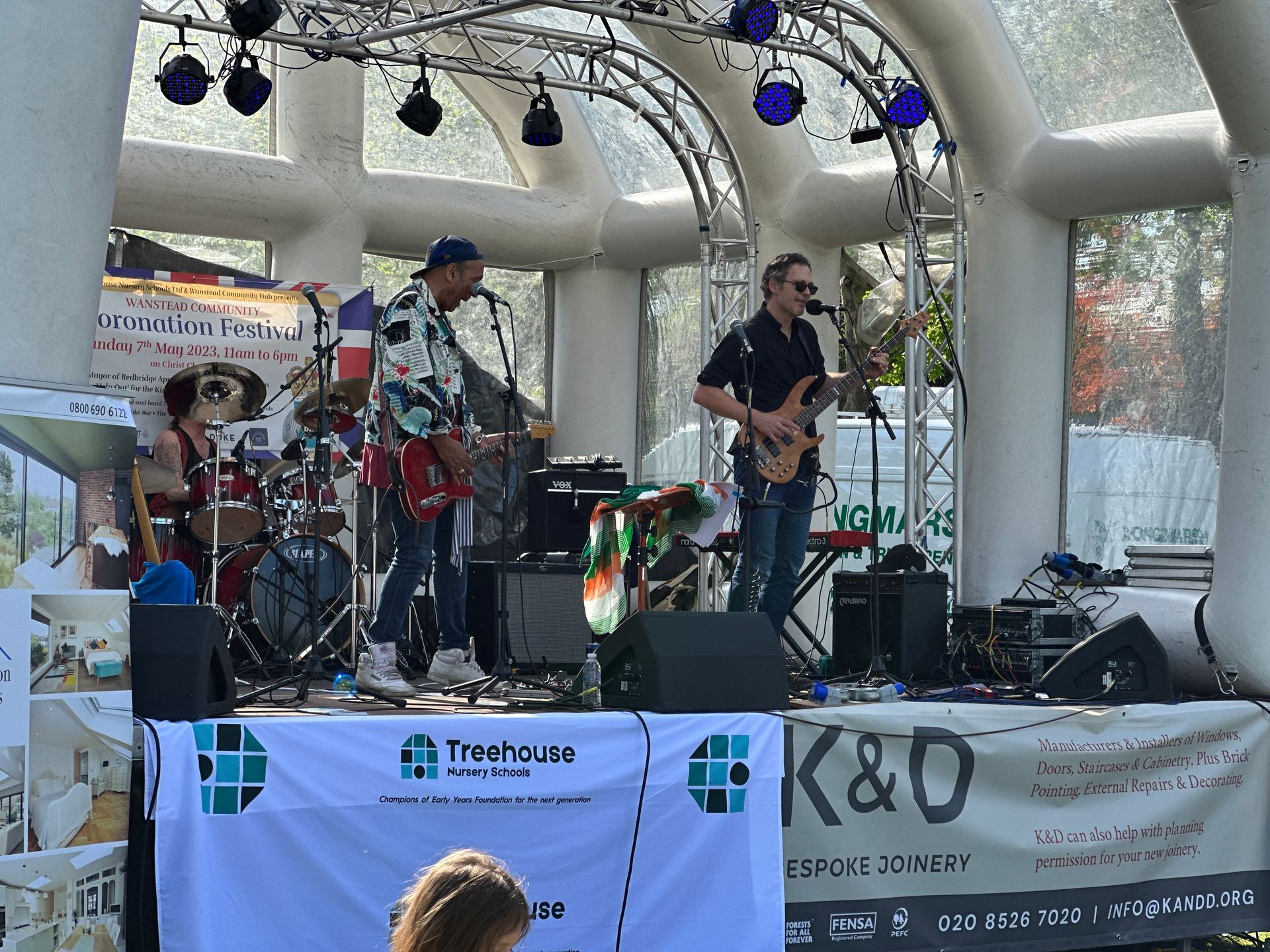 a band performing on an inflatable stage