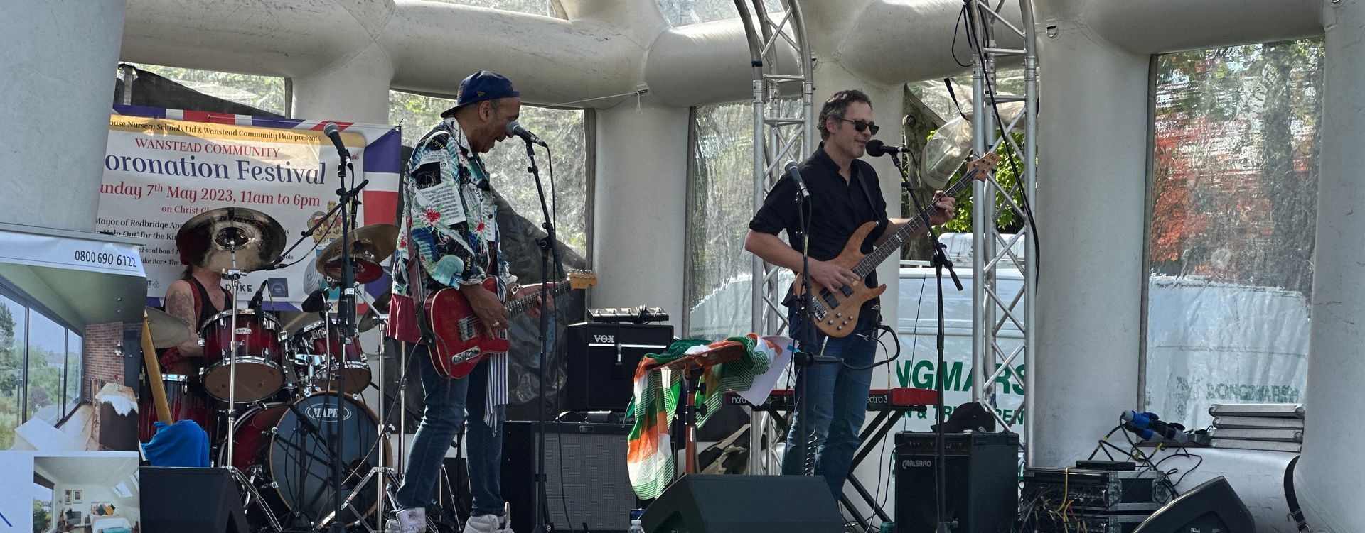 a band playing on an inflatable roof stage