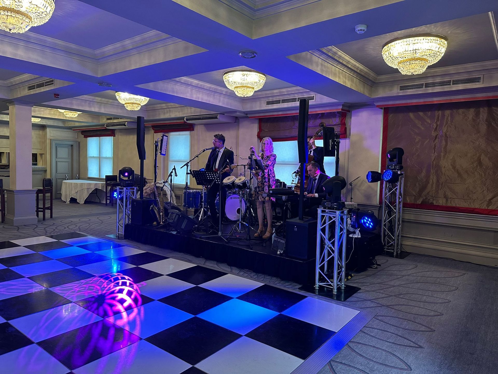 A wedding stage with a band performing on it