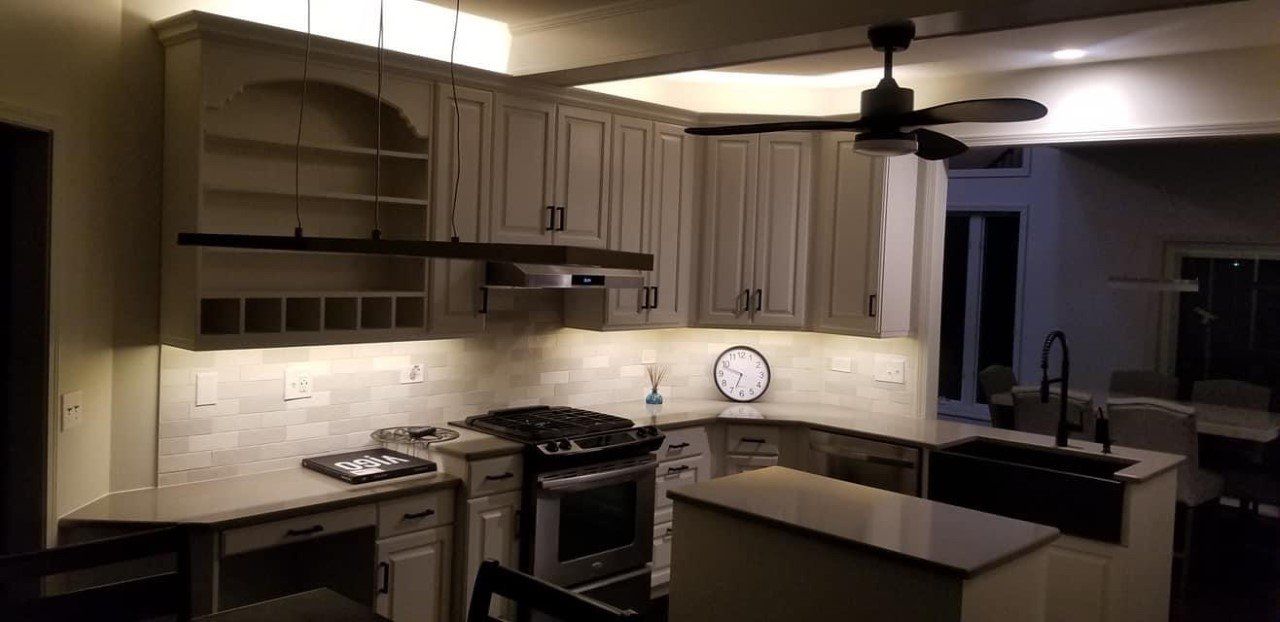 Hanging light with smooth wooden ceiling — Lombard, IL — Cordial Electric Inc.