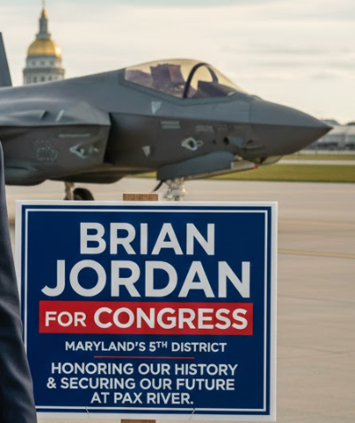 Sign for Brian Jordan for Congress in front of an F-35 fighter jet at Pax River.