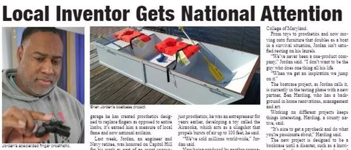 Man holding an object, pictured with a boat. Article titled