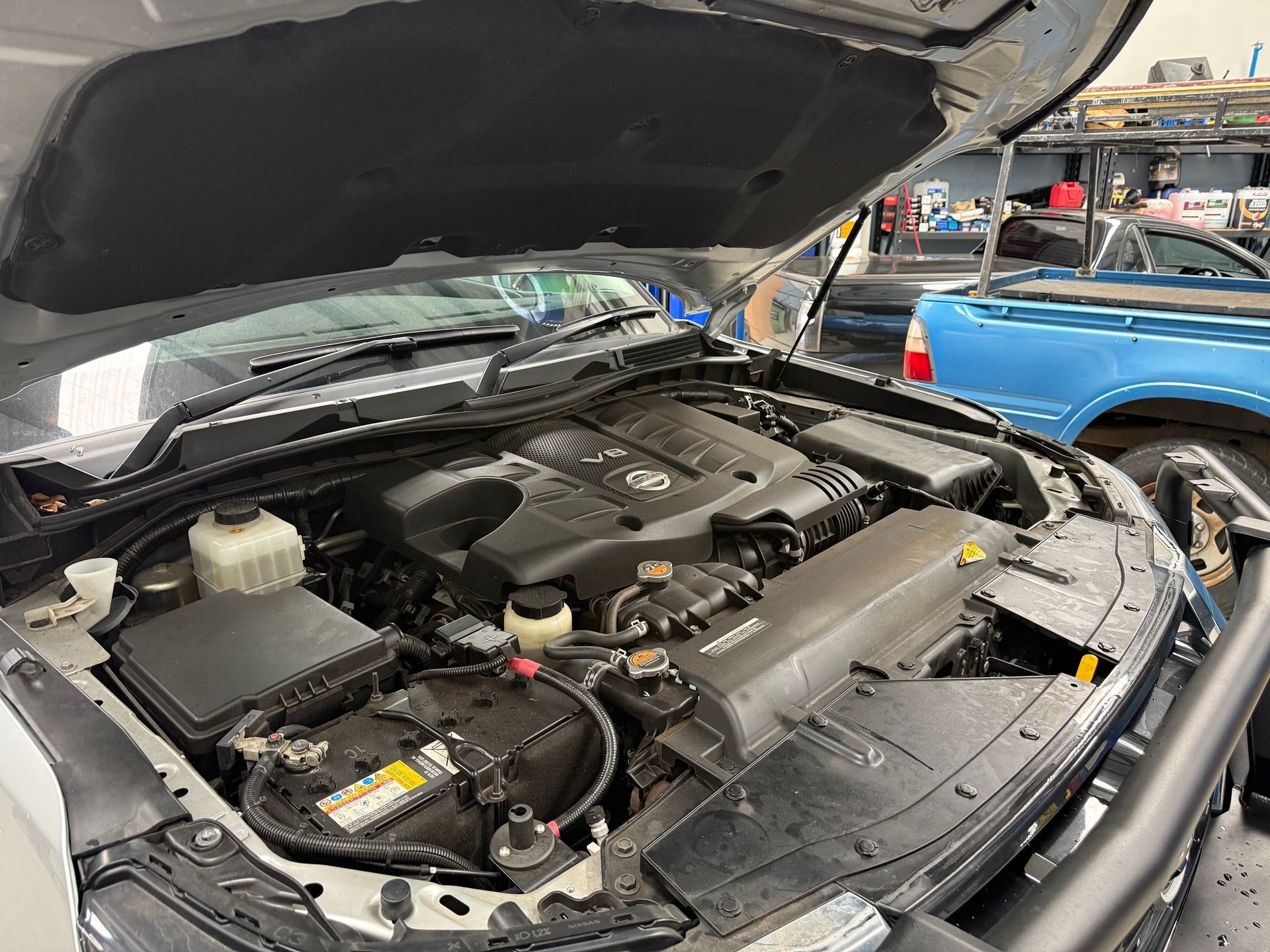 An Open Hood of a Car Revealing a Clean Toyota V6 Engine Bay — Mad Monkeys Mechanical in Cairns City, QLD