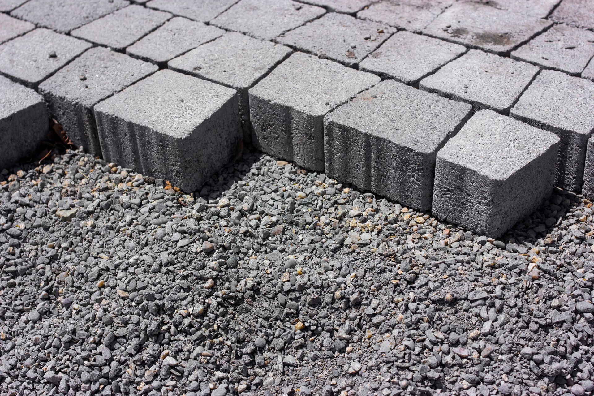 A pile of gravel and bricks on the ground