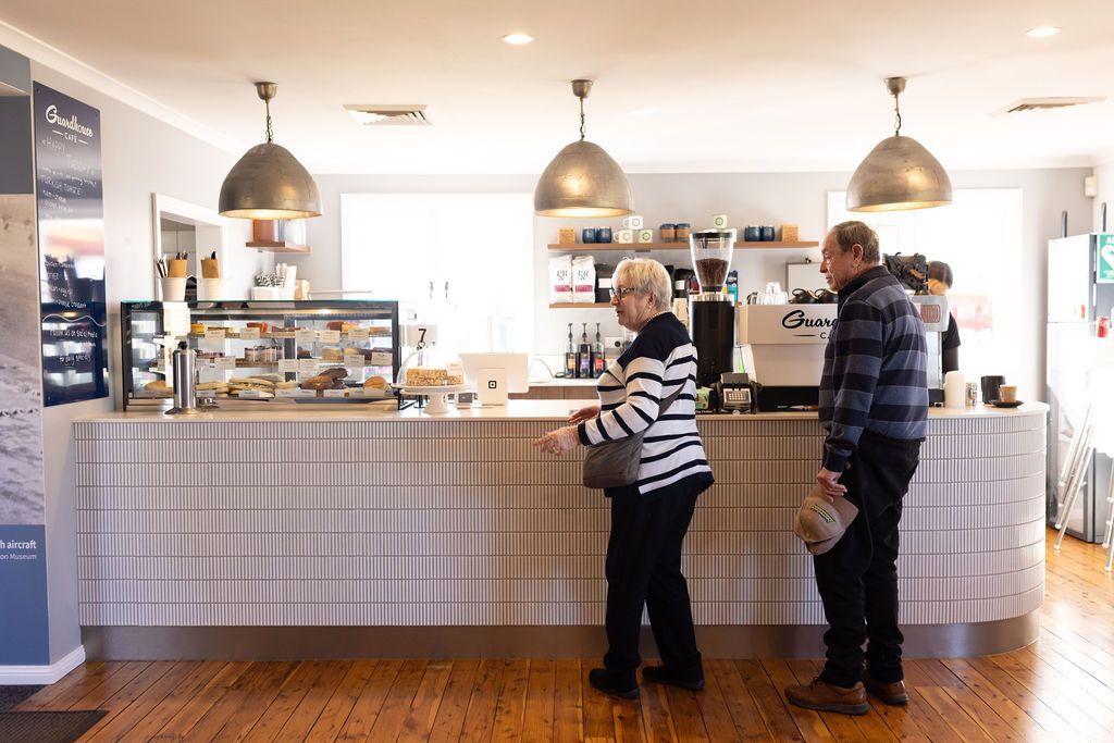 Customers ordering at cafe