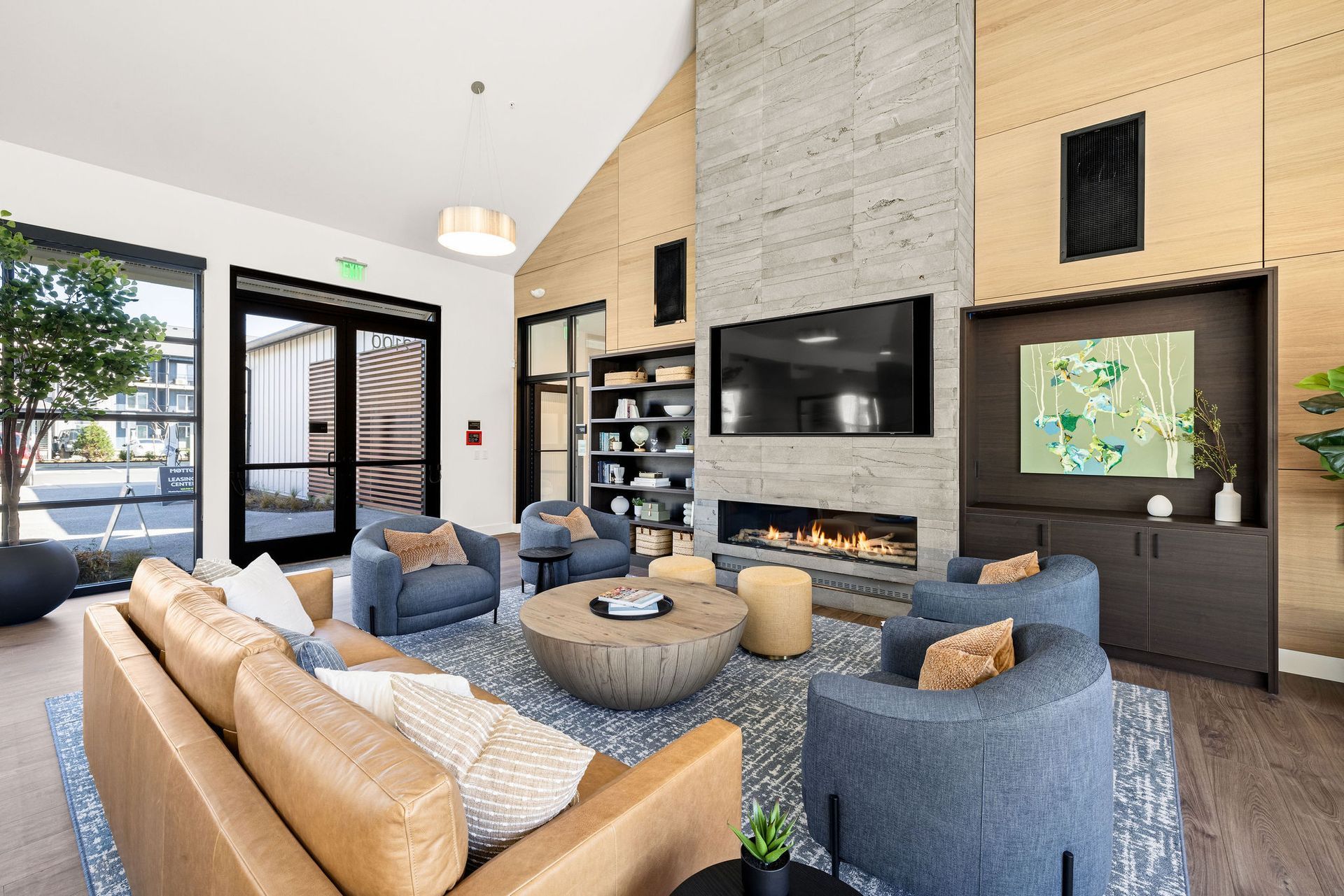 A living room filled with furniture and a fireplace.