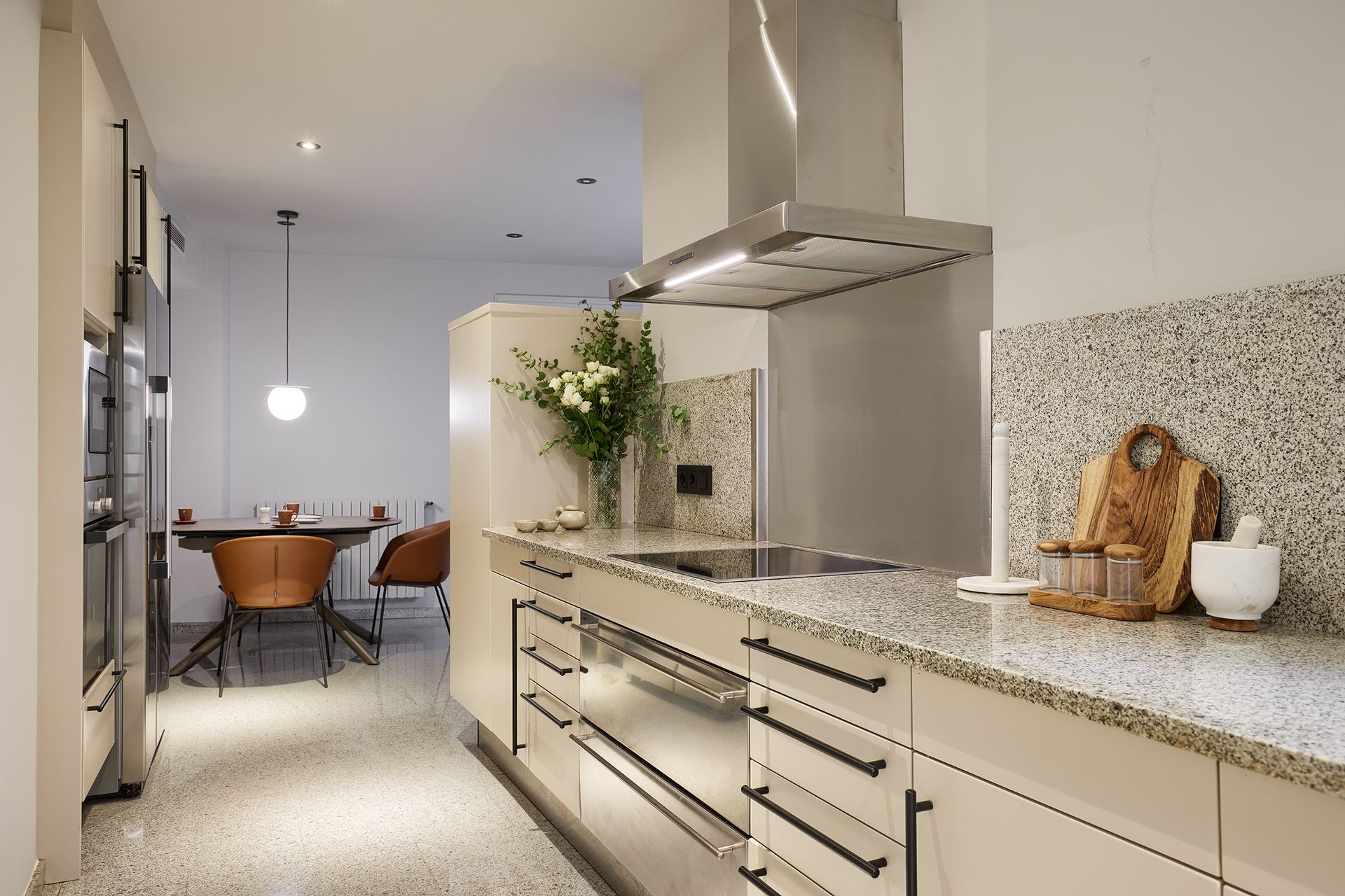 A kitchen with stainless steel appliances and granite counter tops