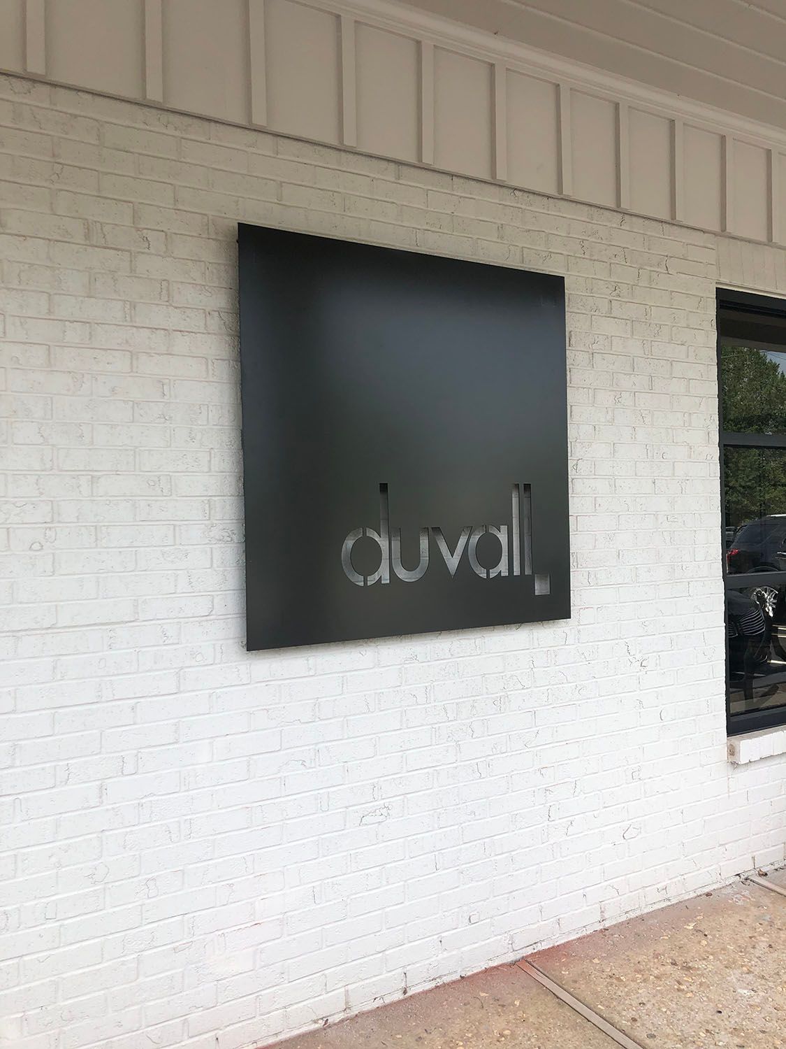 Black square sign with 